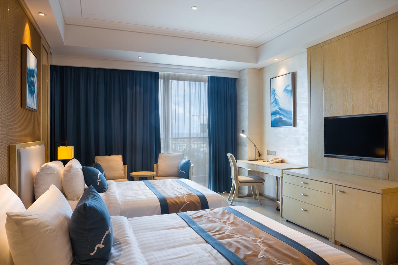 Grand New Century Hotel Szanja Kültér fotó